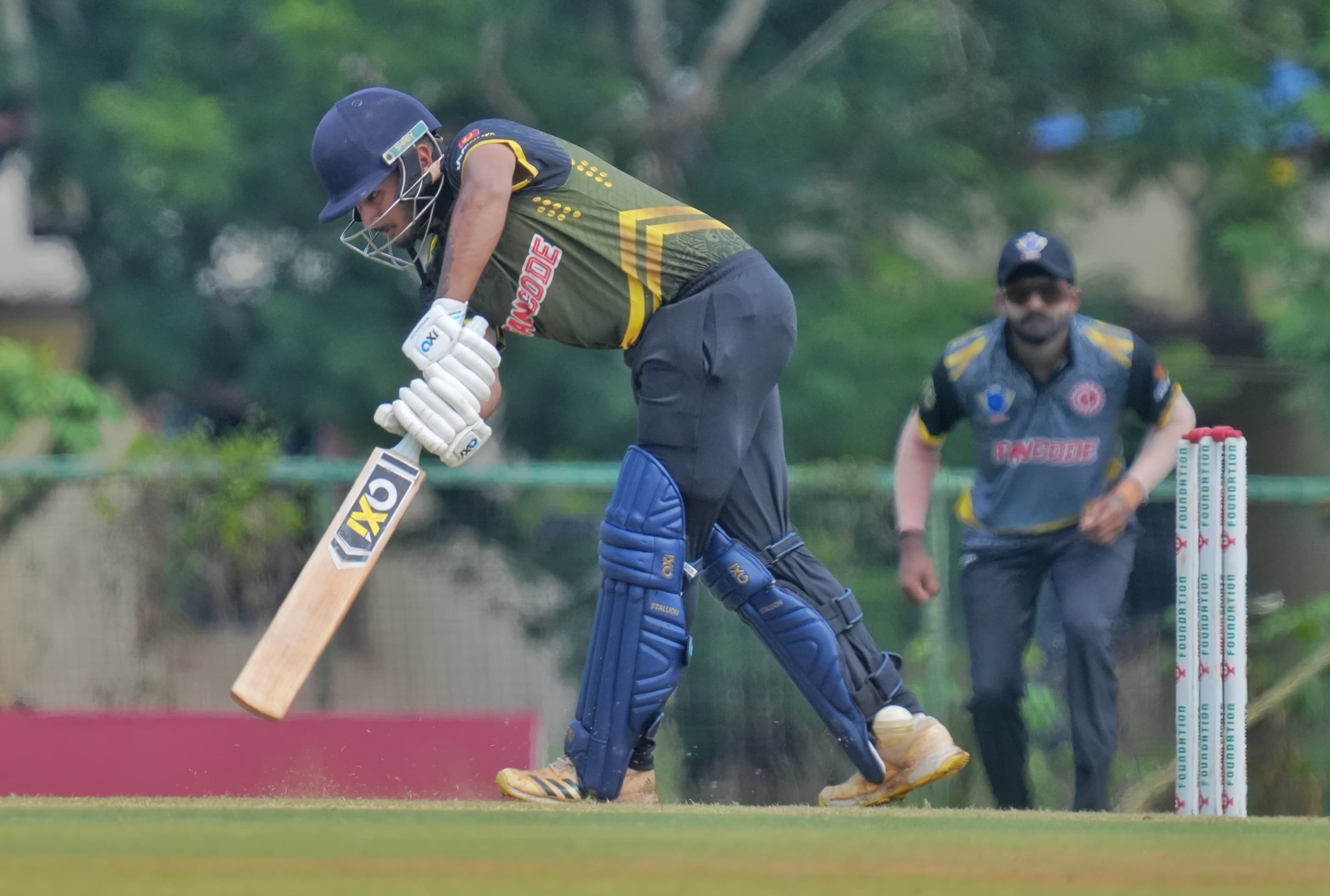 Young cricketer in training